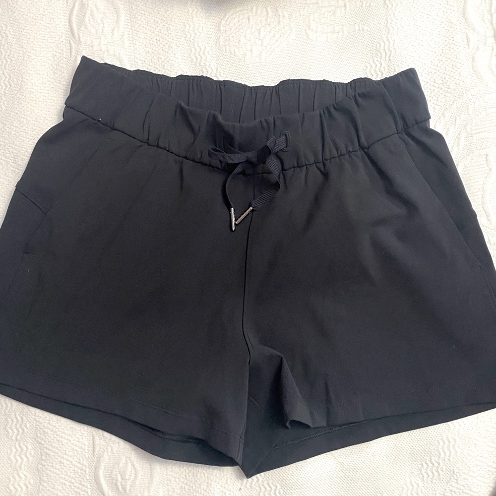 Black Lululemon  shorts with front side pockets.